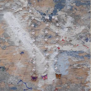 Strikkefisk med sommerfugl